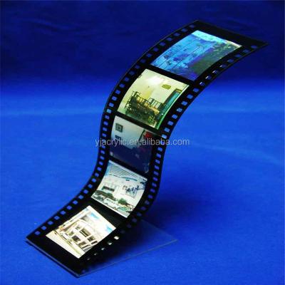 China Acrylic; plexiglass; lucite; PMMA Despoke Film Strip Plexiglass Acrylic Curvy Elegant Acrylic Frame Wavy Photo Frames for sale