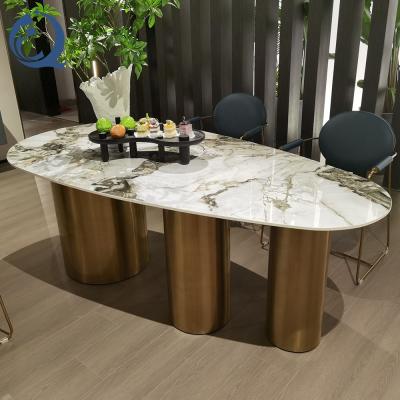 China Stainless Steel Base Dining Table Round Shape Marble Luxury Oval Dining Table for sale