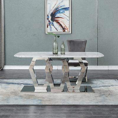 China Turkey Dining Table Stainless Steel Pillar Base Marble Stable Dining Table And Chair Dining Room Furniture for sale