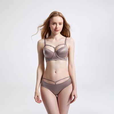 China Sexy seamless chest bra without ring steel gathering, solid color, simple, comfortable, breathable, thin cross bra set for sale