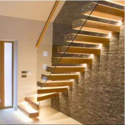 Chine Escalier flottant à LED solide et personnalisé avec poutre d'acier cachée et garde-corps en verre à vendre