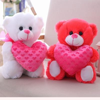 China Eco-friendly Material Custom Logo Stuffed Heart Hugging Plush Toy Mascot Kid Toy Teddy Bear for sale