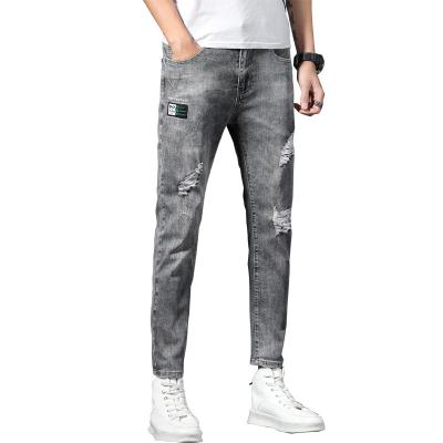 China 100% cotton men's jeans fashion korean fashion brand casual spring and autumn slim fit jeans in 2021 for sale