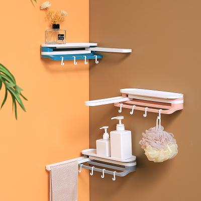 China Modern Hot Punch Free Shelf Towel Rack Non-listing Wall Suction Foldable Storage Rack for sale