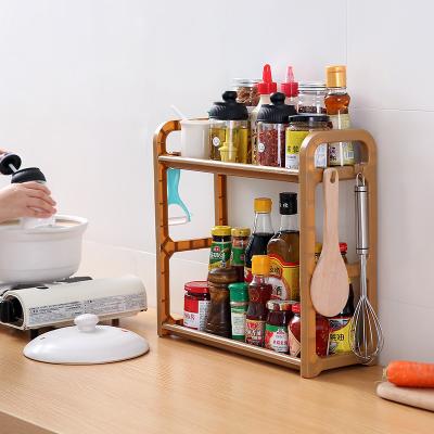 China Simple Viable Kitchen Shelf Kitchen And Bathroom Storage Rack Kitchen Seasoning Rack With Hook for sale