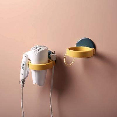 China Punch Free Hair Dryer Hanger Bathroom Wall Mount Hair Dryer Rack Stand Fan for sale