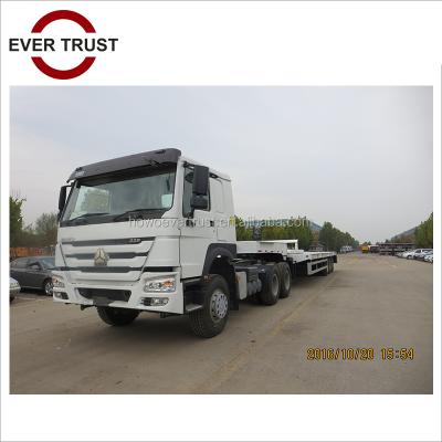 China Low truck trailer price 60 ton tri axle 3 axle used lowbed semi trailer for sale for sale