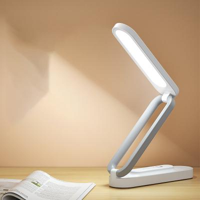 China Modern Eye Care Desk Reading Modern Foldable Smart Usb Rechargeable Wireless Charger Led Desk Lamp for sale