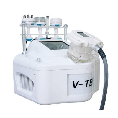 China Portable Automatic Cavitation Vacuum RF Cavitation Reduction Cellulite Roller V Shape Removal Roller Fat Body Slimming Machine Price for sale