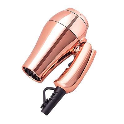 China Ionic Compact 1200W Folding Handle Hair Dryer Concentrator and Diffuser Mini Voltage Portable Dual Travel Hair Dryer for sale