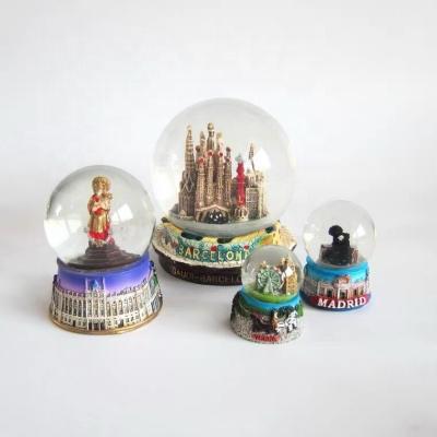 China Hot Sale 65mm Wholesale Promotional Folk Art 2022 45mm Souvenir Gift Snow Globes Cheap Custom Snow Globe Snow Globe for sale