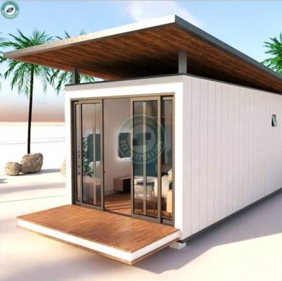 China White Modern Modular Tiny Beach Home Leisure Container PVC Cladded Prefab House With Slope Roof Cabin For Vacation for sale