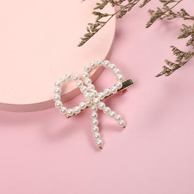 China High Quality Eco-friendly Butterfly Women Hair Pins Accessories For Women Ivory Simulation Pearl Barrette Pearl Hair Accessories Girls for sale