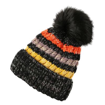 China Women's High Top Wholesale Logo Warm Caps Strip Winter Custom Beanie Knit Hats With Pom for sale