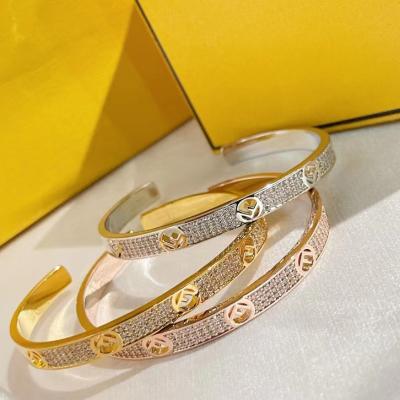 China Custom exquisite and supple simple high-grade thick gold s on the other new bracelet F letter full gold plating product V diamond bracelet for sale