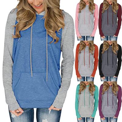 China Autumn Winter New Ladies Casual Anti-Wrinkle Loose Hedges Hit Color Raglan Sleeves Pocket Hooded Sweatshirts Casual Tops for sale