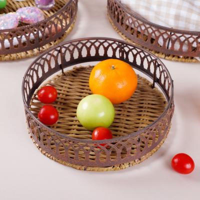 China Customized Sustainable Shape Hand - Woven Wicker Round Tray Basket Stackable Storage Baskets With Iron Frame for sale