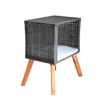 China Breathable Handmade Plastic Woven Pet Cat Cage Storage Basket With Soft Mat And Wooden Shelf for sale