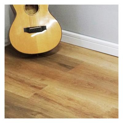 China Waterproof And Fire Retardant Luxury Vinyl Wood Plank Texture Cork Floating Floor Bathroom Vinyl Panel Tiles 5mm Spc Lvp for sale