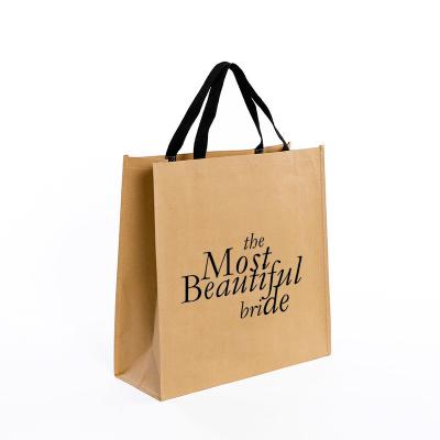 China Reusable Custom Printed Logo Eco Friendly Shopping Brown Paper Tote Bag For Clothes Packing for sale