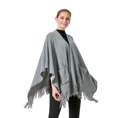 China Knitted tassel with pockets shawls for women winter shawl for women pashmina shawl for sale