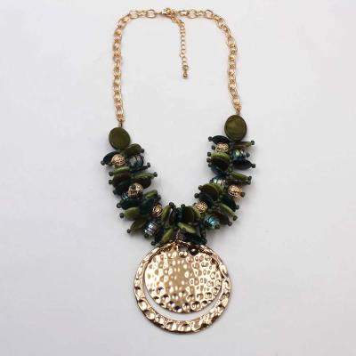 China TRENDY Fashion Jewelry Ladies Group Green Broom Shell Mruano Glass Beads Hammered Statement Pendant Necklace for sale