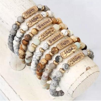 China Hot punk selling European and American wild natural volcanic stone yoga stone inscription alloy frosted bracelet for sale