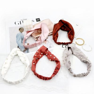 China Fashion Lady UNIQ's Pretty Cross Headbands High Quality Elastic Headbands With Pearls Elastic Elegant Head Wraps Silk Cloth Head Band Scarf for sale