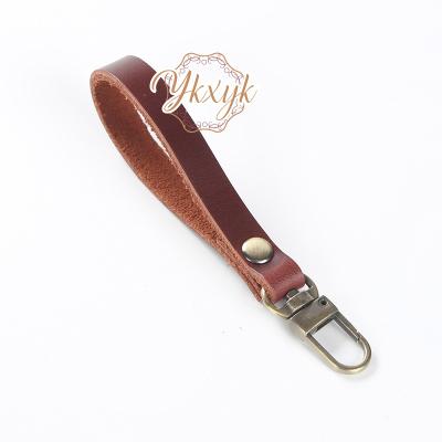 China 2021 luxury high quality genuine leather wrist strap for purse/camera/pocket for sale