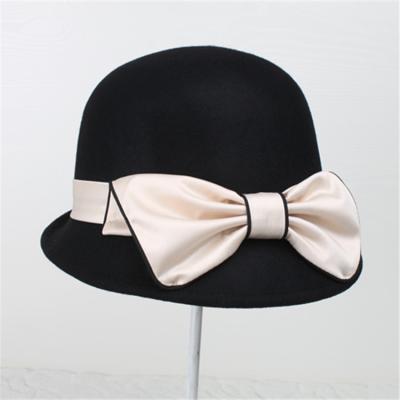 China 2021 New Image Style Ladies Wool Hat Fashionable England Style Woolen Big Bowknot Formal Elegant Bucket Hat for sale