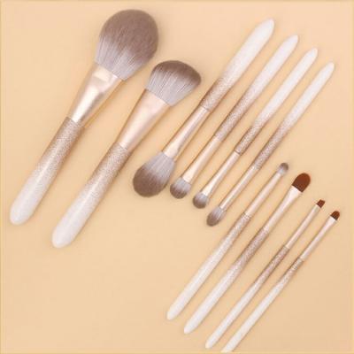 China Angular Blush High Level Luxury Crystal Professional Makeup Brushes White 10 Piece Makeup Brushes Set for sale