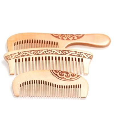 China Comfortable Peach Natural Wood Handcrafted Wide Tooth Comb Anti-Static Massage Head Hair Brush for sale