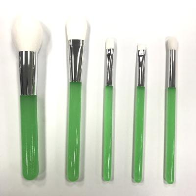 China Angular Blush Green Fluorescence Makeup Brush Customized Cosmetics Sweeps Night Light Make Up Brush for sale