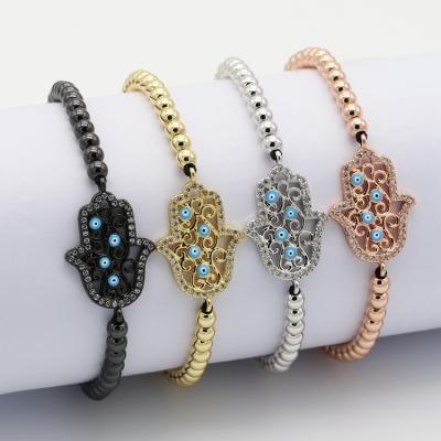 China CZ Hamsa Religious Imaginative Handmade Jewelry Bracelets Micro Brass Blue Stone Evil Eye Bracelet for sale