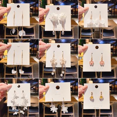 China Wholesale Cute Daisy Star Heart Drop Earrings Female Geometric Pearl Fashion Long Tassel Stud Earrings Retro for sale