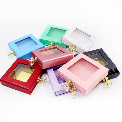 China Long Natural Eyelash Packaging Box 3D 5D 25MM Custom Lashes With Custom Lashbox Diamond Handle Lashcases Square Money Lashbox for sale