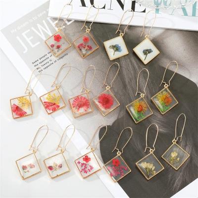 China Retro Drop Glue Flower Glue Flower Female Creative Personality Eternal Flower Earring Fashionable Simple Geometric Square Dry Jewelry for sale