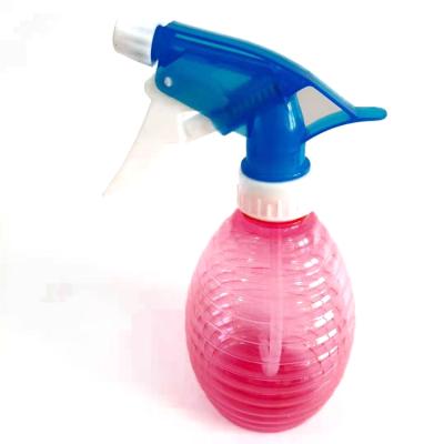 China Modern environmental protection pomegranate high quality plastic transparent kettle spray watering can for plants indoor watering can for sale