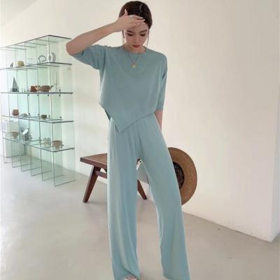 China Anti-Wrinkle Fashion Women Summer Ice Silk Breathable Short Sleeve Irregular Tops And Loose Long Pants Sweater Set for sale