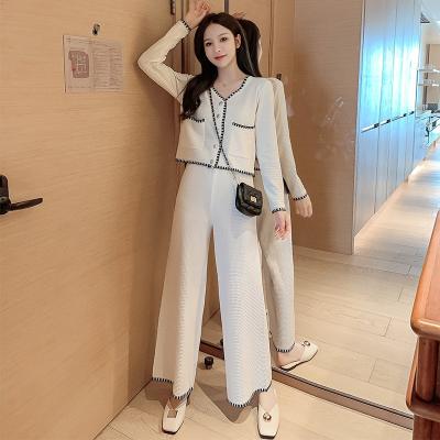 China Anti-wrinkle fashionable women spring new arrival v neck sleeve top long and loose long pants ice silk sweater set for sale