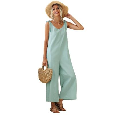 China Anti-Wrinkle Tie Bow Canvas Like Suspender Overalls Summer Women's Button Overalls Casual Wide Leg Pants Rompers Female Playsuits for sale