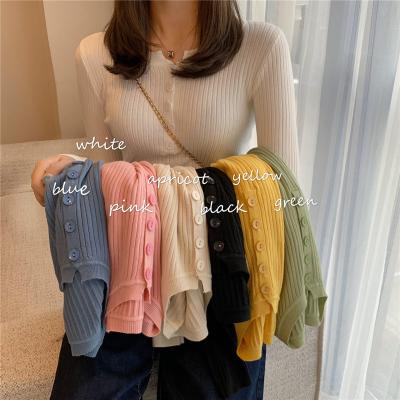 China Anti-wrinkle solid color blouse ribbon women running knitted sweaters tops blusas autumn winter clothing buttons fashionable sweater for sale