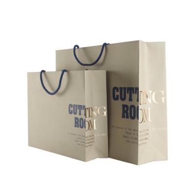 China Recycled Materials Custom Design Coated paper filmed hot silver cotton rope paper bag for sale