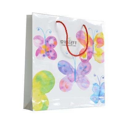 China Recycled Materials Coated paper color printing glossy filmed nylon rope custom paper bag kraft al por mayor for sale