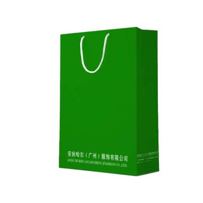 China Recycled Materials Customized Logo Special Paper Matt Film Gift Packaging Bag With Handle for sale