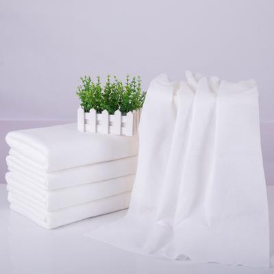 China Soft Highly Efficient Spunlace Disposable Absorbent Eco-Friendly Nonwoven Nonwoven Disposable Shower Towel for sale