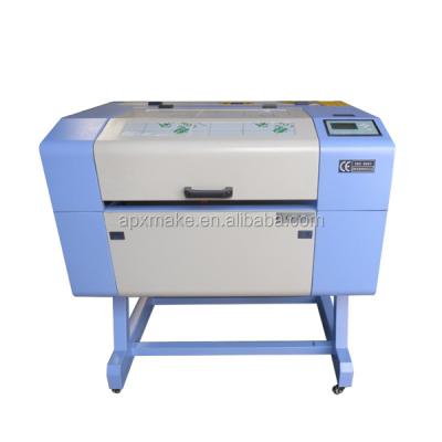 China Laser CUTTING Mobile CNC ROUTER 6040 Screen Protector Laser Cutting Machine Manufacturer for sale