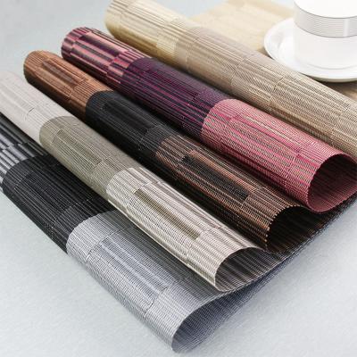 China Sustainable Multi Color Stripe PVC Table Easy Wash Pattern Woven Place Mat for sale