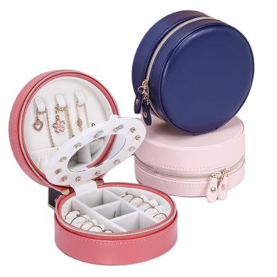 China Fashionable PU Velvet Round Hot Pink Leather Jewelry Box With Zipper for sale