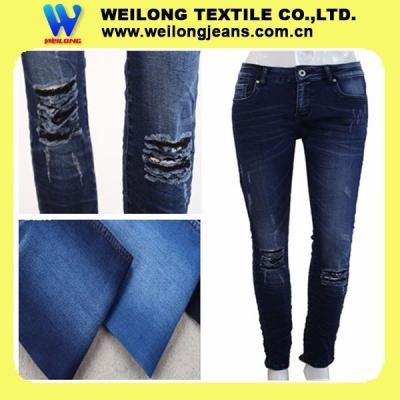 China 8.5 Oz Stylish Women'S Jeans Summer Weight Denim Fabric Material Jean Fabric for sale